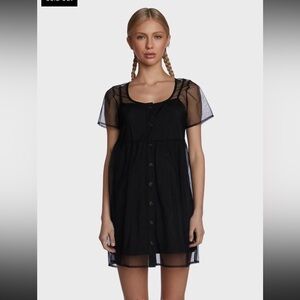 Delia’s black organza dress